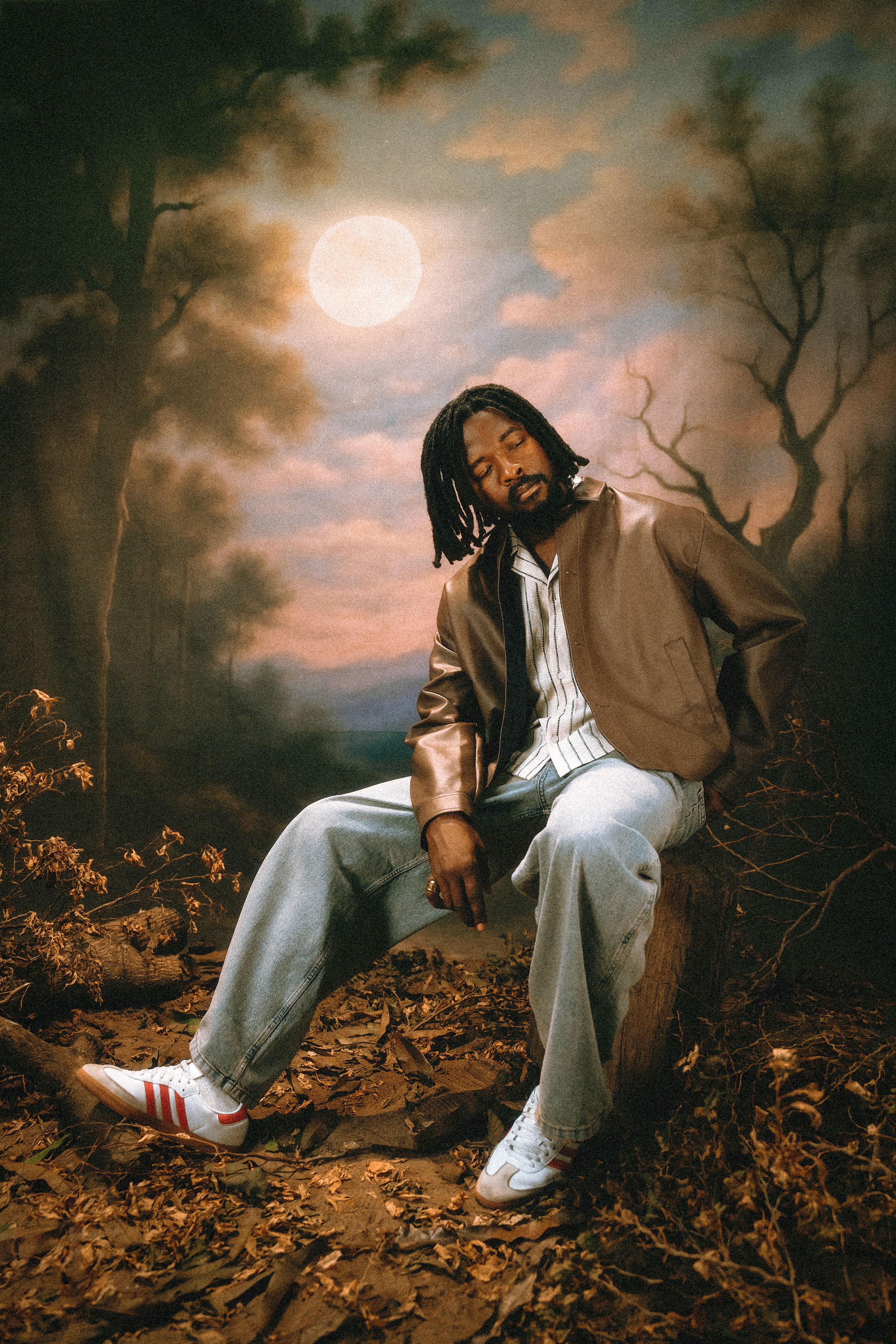 Artist portrait — moonlit painted backdrop